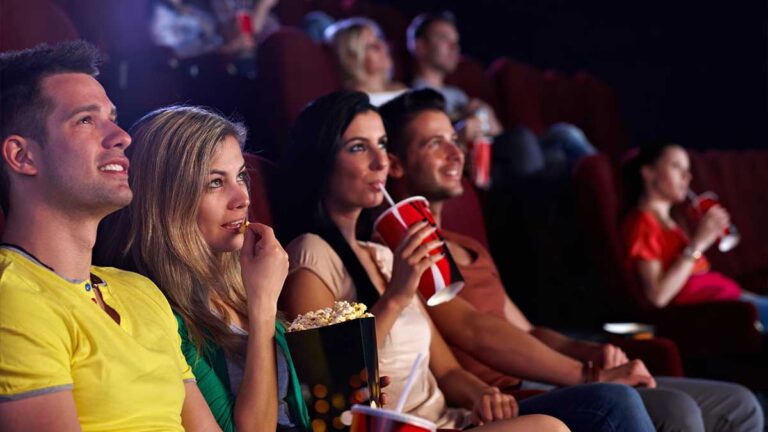 group-of-moviegoers-enjoying-a-film-in-a-movie-theater