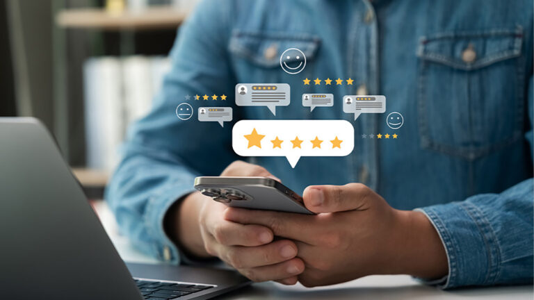 Person holding smartphone with floating star ratings and review icons, representing online credibility, trust signals, and customer testimonials for SEO