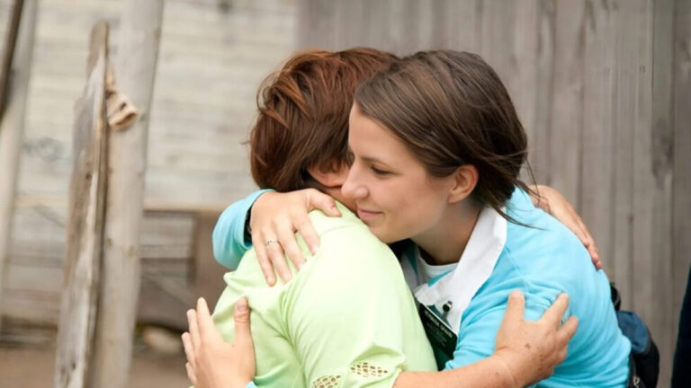 woman-hugging-a-need-child